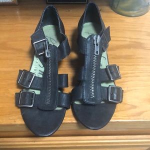 Wedge sandals by Blowfish. Zipper front. Side entry with buckle.